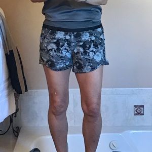 Tangerine camo running shorts